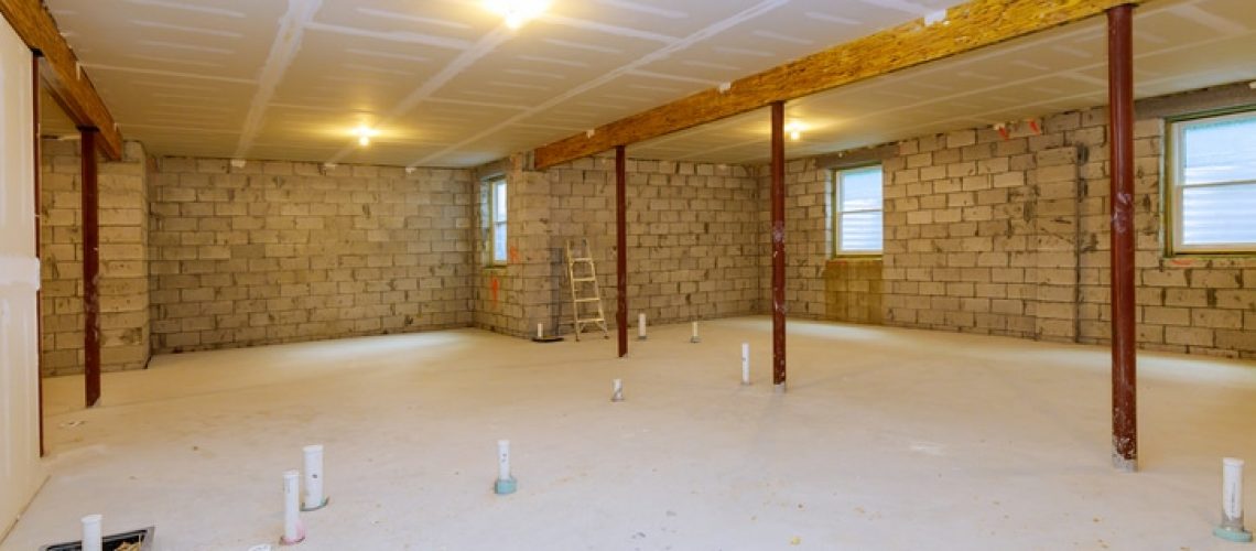 Basement renovation unfinished interior frame of a new house under construction