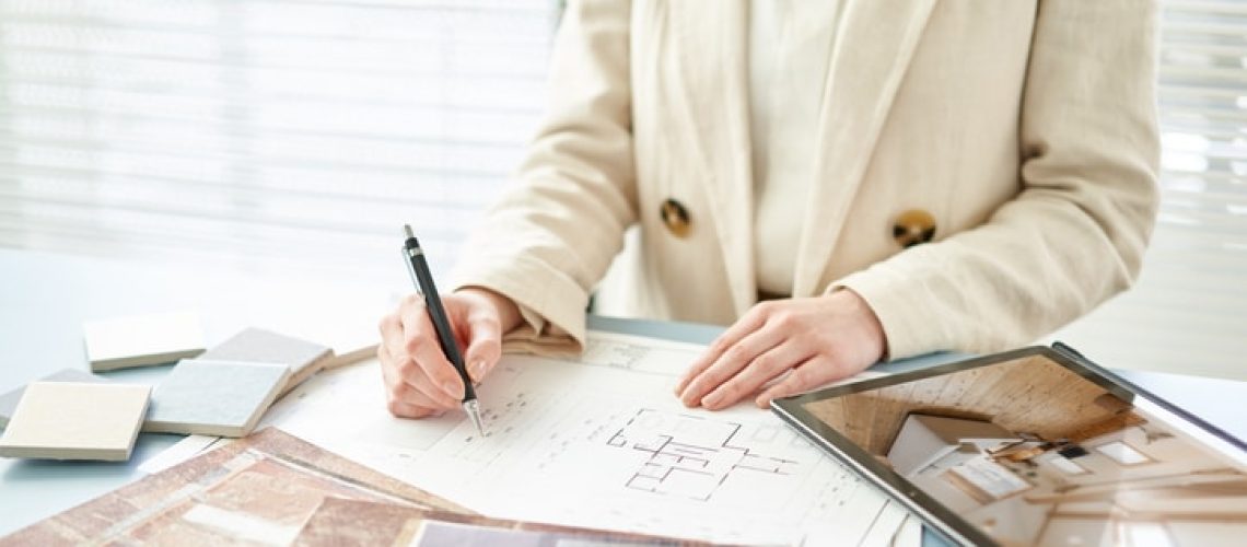 Asian interior designer thinking about home interior