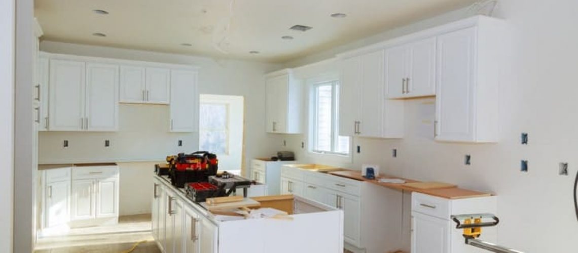 Installing new induction hob in modern kitchen in Calgary